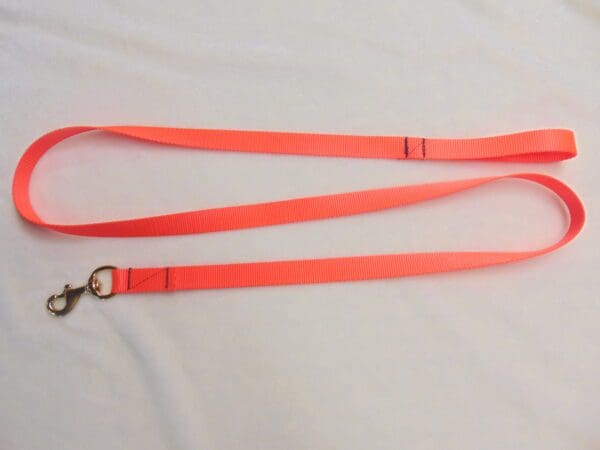 A neon orange lanyard with a metal ring.